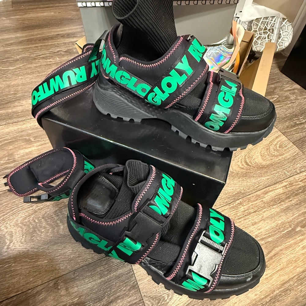Dolls Kill Black and Green Sneakers with Bold Design